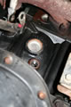 Passenger side block drain (behind starter)